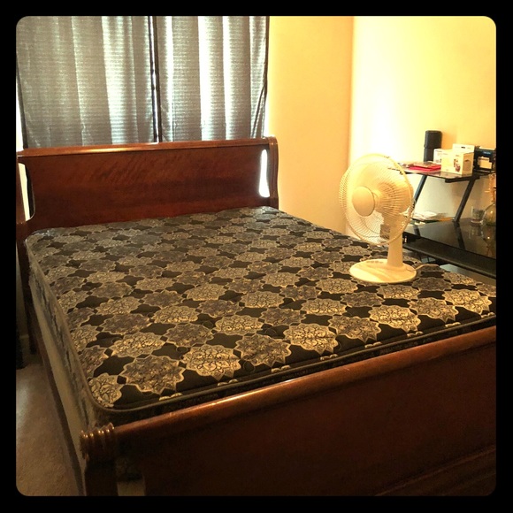 Wooden bed frame along with brand new mattress